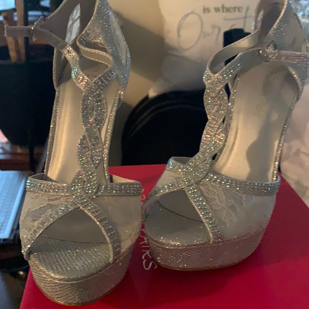 Brand new with box silver heels
